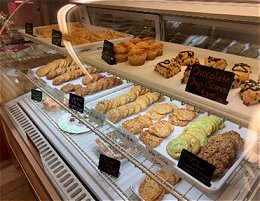 Counter featuring a variety of baked goods