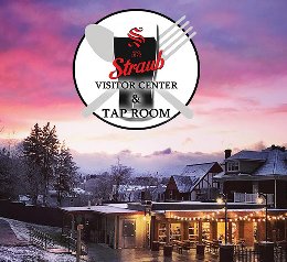 Straub Tap Room complex at dusk