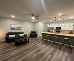 Open floor plan showing living space and kitchen