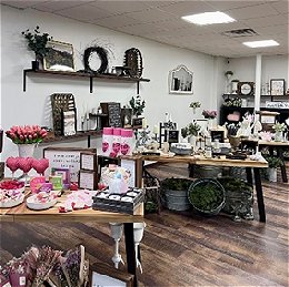 Lizzie Jane Co. sales floor showing displays of items for purchase