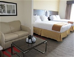 Holiday Inn Express - room with double beds and sitting area with couch