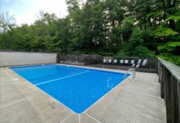 Cozy Embers wooded campground with swimming pool